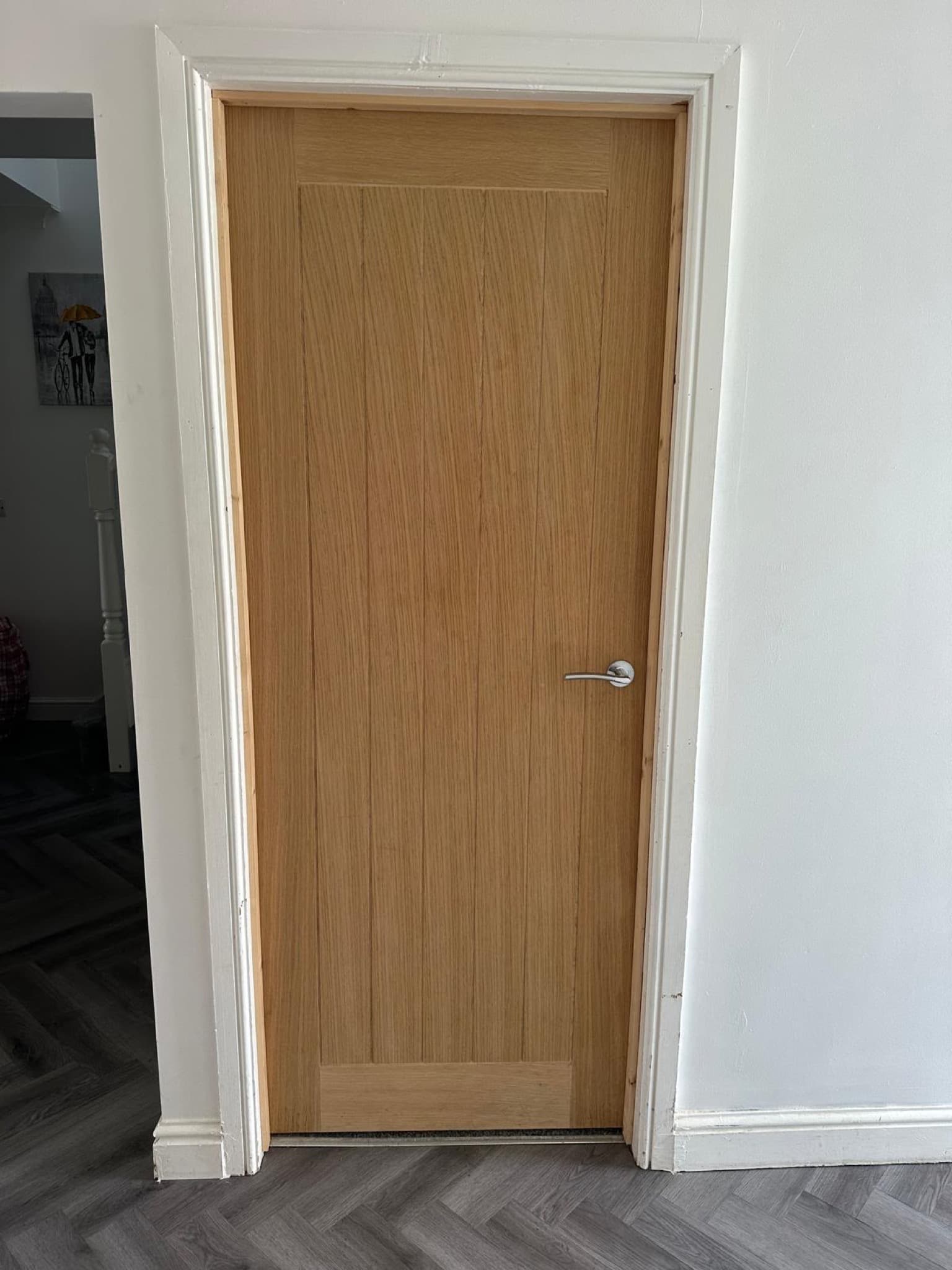 Natural oak internal doors with dark handles